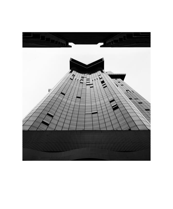 Black and white photograph by Bradley Cummings titled LOOKING UP #22304, Southbank, 2024.
