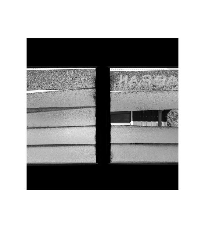 Black and white photograph by Bradley Cummings titled BROKEN SLAT WINDOW, Point Nepean, 2025.