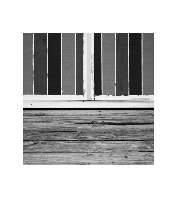Black and white photograph by Bradley Cummings titled SEASIDE BATHING BOX DETAIL, Dromana, 2025